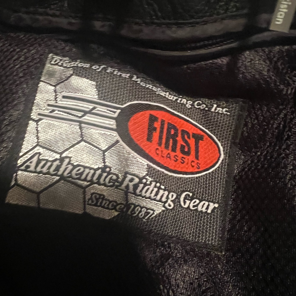 Brand new leather riding coat worn once.